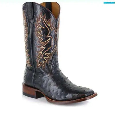 Mid-calf embroidered cowboy boots paired with jeans lifestyle image