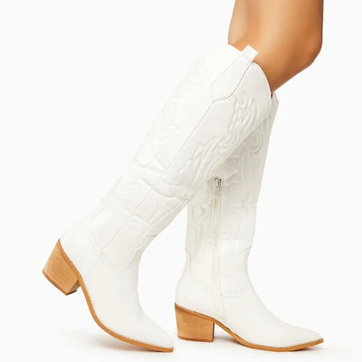 White cowboy boots women's style with pointed toe design